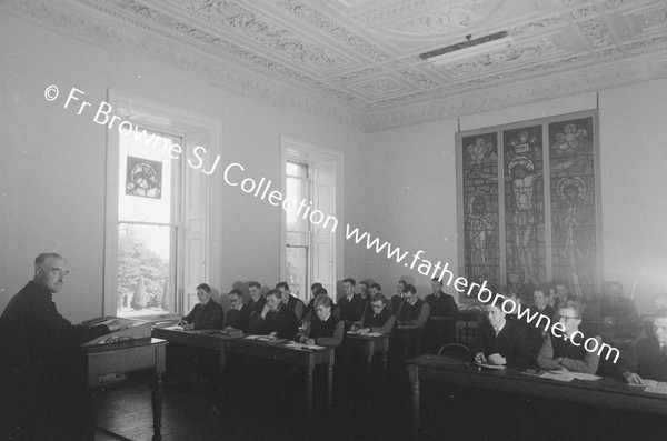 FOR JESUIT DIRECTORY 1955: FR.O'SULLIVAN GIVING CONFERENCE TO NOVS